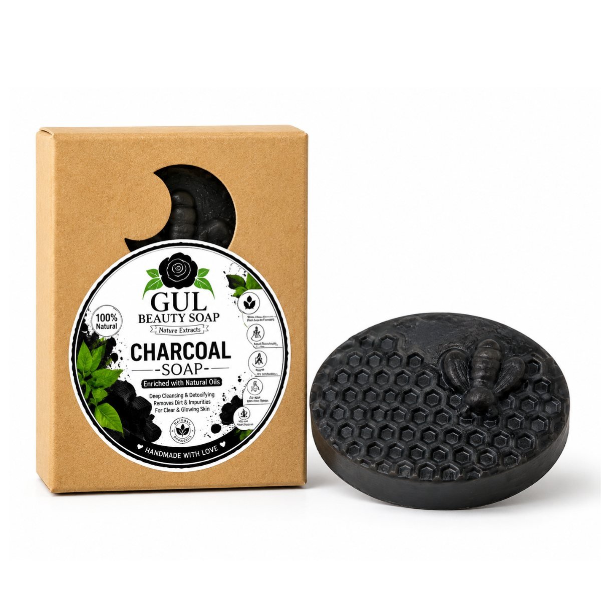 Gul Beauty Soap activated charcoal soap bar in deep black beside its kraft box with a charcoal and leaf label